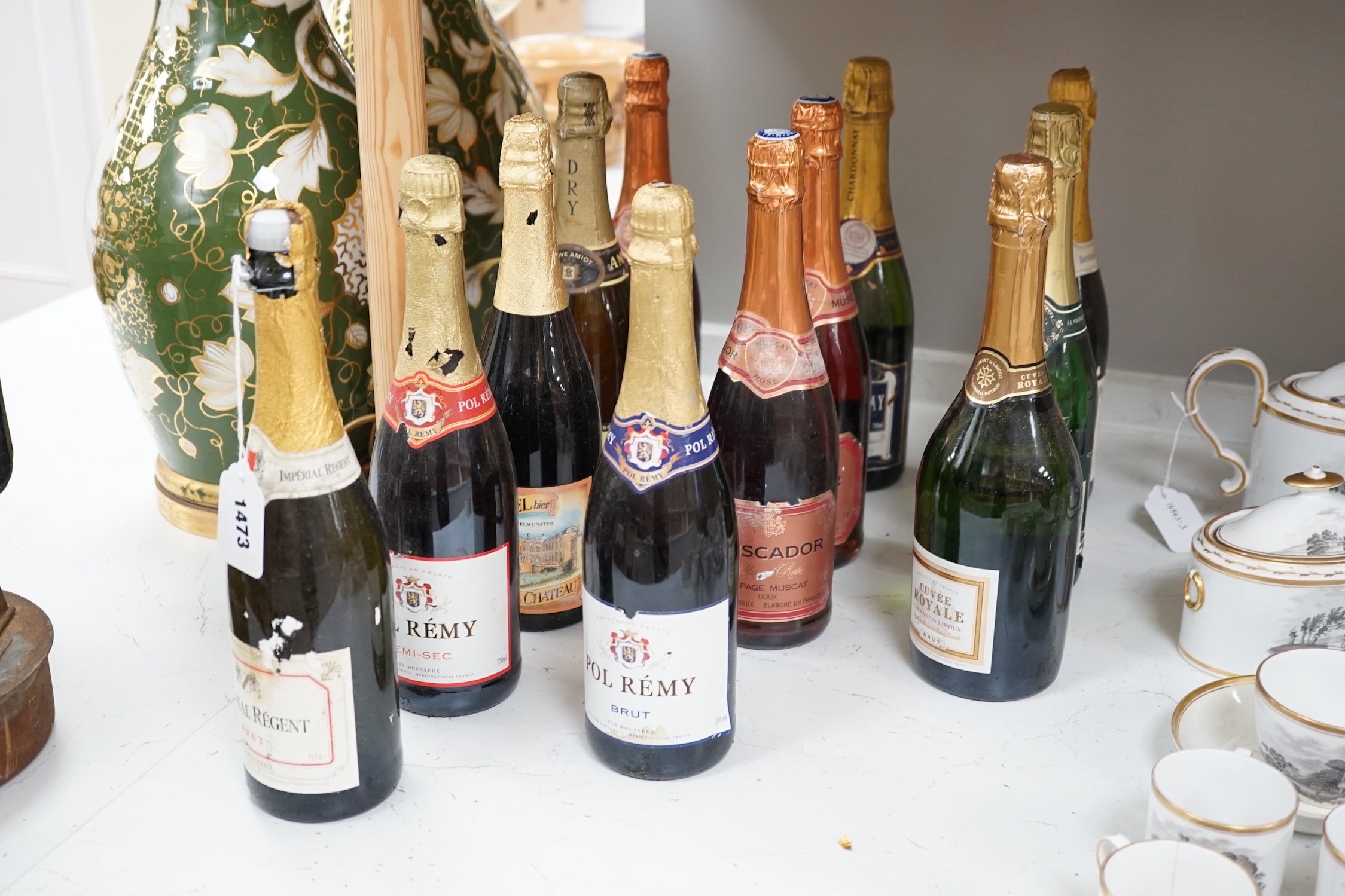 Fifteen bottles of sparkling wine to include Muscador, Lindauer, and Pol Remy. Condition - fair, storage history unknown